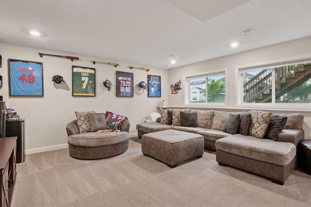 17552 57th St NE, Otsego, MN 55374 - living room featuring light colored carpet, recessed lighting, and a textured ceiling