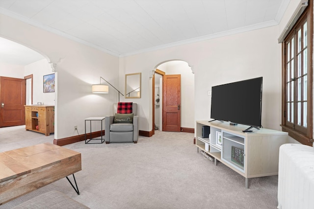 952 Goodrich Ave, Saint Paul, MN 55105 - living room with arched walkways, light colored carpet, and crown molding