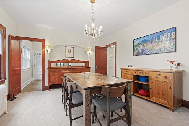 952 Goodrich Ave, Saint Paul, MN 55105 - dining space with a chandelier and light colored carpet