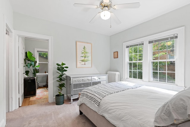 952 Goodrich Ave, Saint Paul, MN 55105 - carpeted bedroom with radiator heating unit and ceiling fan