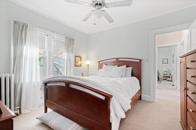 952 Goodrich Ave, Saint Paul, MN 55105 - bedroom featuring radiator heating unit, light carpet, crown molding, and a ceiling fan