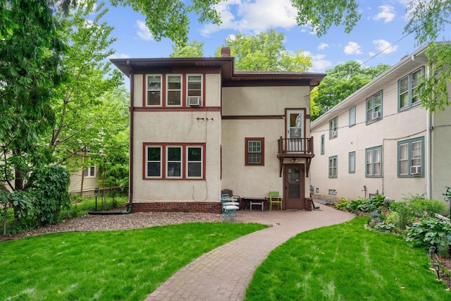952 Goodrich Ave, Saint Paul, MN 55105 - rear view of property with a lawn, a balcony, cooling unit, and a chimney