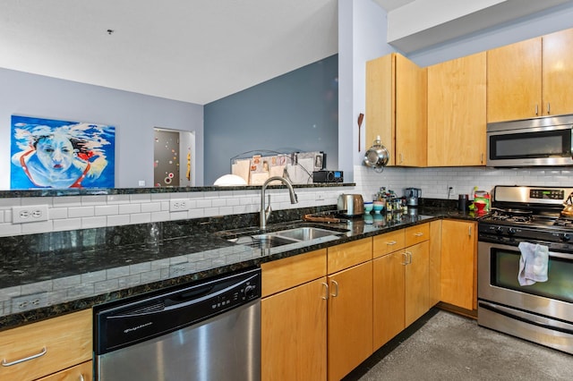 2650 University Ave W Unit 1, Saint Paul, MN 55114 - kitchen featuring appliances with stainless steel finishes, tasteful backsplash, and dark stone counters