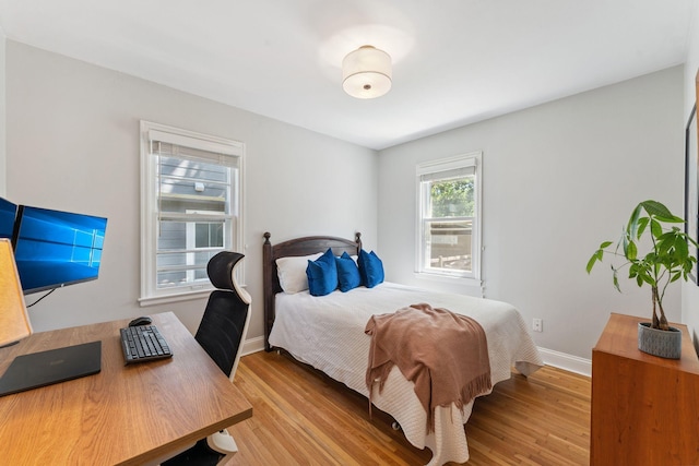 5605 Logan Ave S, Minneapolis, MN 55419 - bedroom featuring light wood-style floors and an office area
