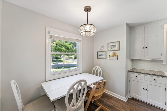 5605 Logan Ave S, Minneapolis, MN 55419 - dining area featuring dark wood-type flooring and a chandelier