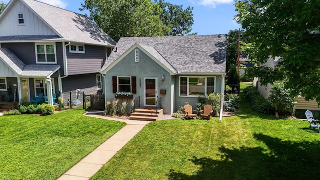 5605 Logan Ave S, Minneapolis, MN 55419 - view of front facade featuring a shingled roof and board and batten siding
