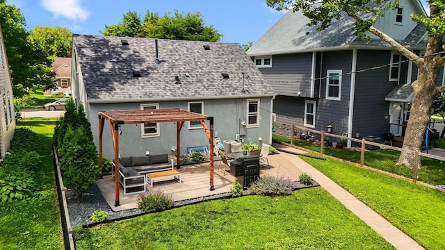 5605 Logan Ave S, Minneapolis, MN 55419 - back of property featuring a pergola, an outdoor hangout area, roof with shingles, stucco siding, and a patio area