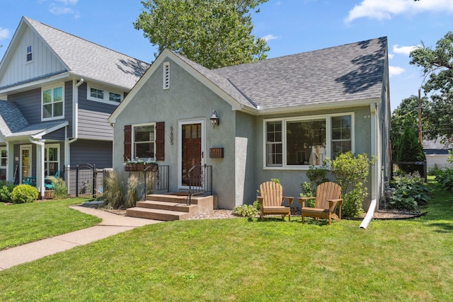 5605 Logan Ave S, Minneapolis, MN 55419 - view of front of house with roof with shingles and board and batten siding