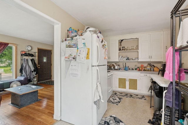 3810 Regent Ave N, Robbinsdale, MN 55422 - kitchen with white appliances, open shelves, white cabinets, and light countertops