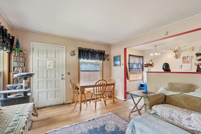 3810 Regent Ave N, Robbinsdale, MN 55422 - living room featuring wood finished floors and baseboards
