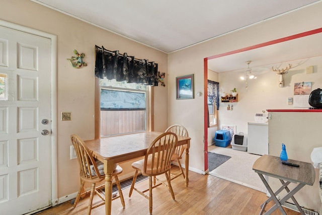 3810 Regent Ave N, Robbinsdale, MN 55422 - dining area with light wood finished floors and baseboards