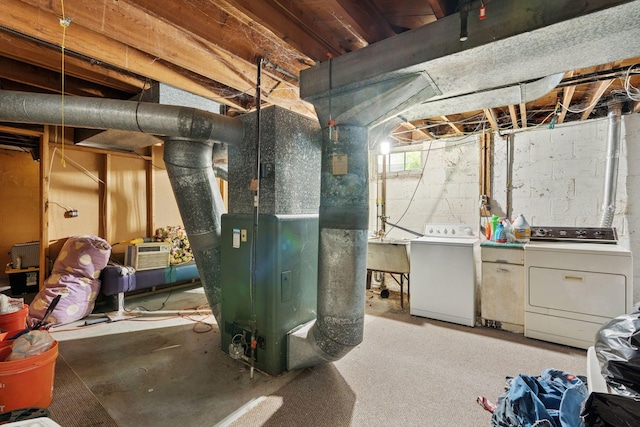 3810 Regent Ave N, Robbinsdale, MN 55422 - below grade area featuring washing machine and clothes dryer and heating unit