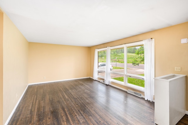 1229 Arrowhead Rd, Duluth, MN 55811 - empty room featuring dark wood finished floors and baseboards