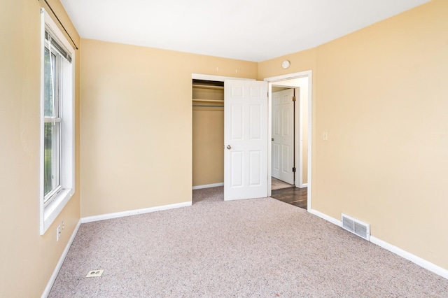 1229 Arrowhead Rd, Duluth, MN 55811 - unfurnished bedroom featuring carpet and a closet