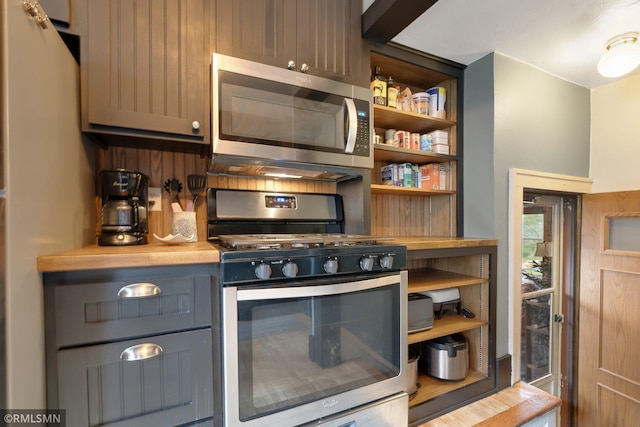 5116 28th Ave S, Minneapolis, MN 55417 - kitchen featuring stainless steel appliances and open shelves