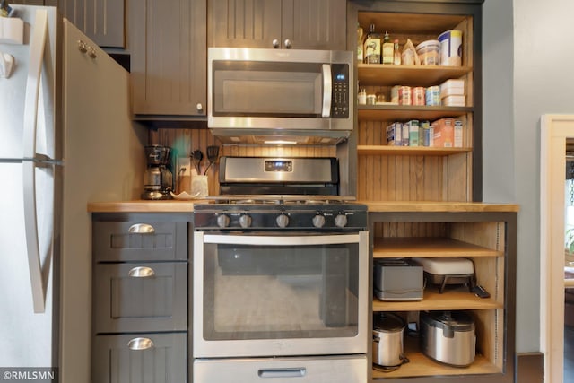 5116 28th Ave S, Minneapolis, MN 55417 - kitchen featuring appliances with stainless steel finishes and gray cabinets
