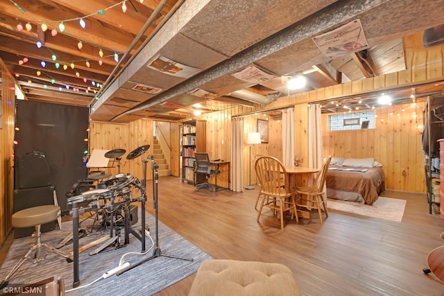 5116 28th Ave S, Minneapolis, MN 55417 - dining space featuring wood walls, wood finished floors, and stairway