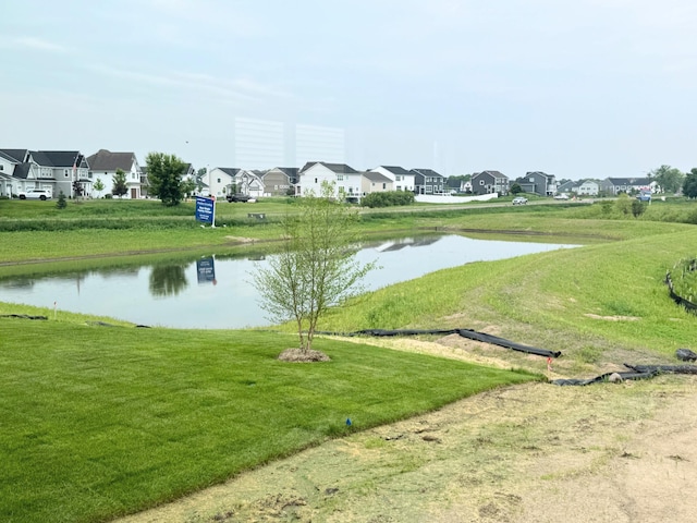 7031 Lannon Ave NE, Otsego, MN 55301 - view of property's community featuring a residential view, a water view, and a yard