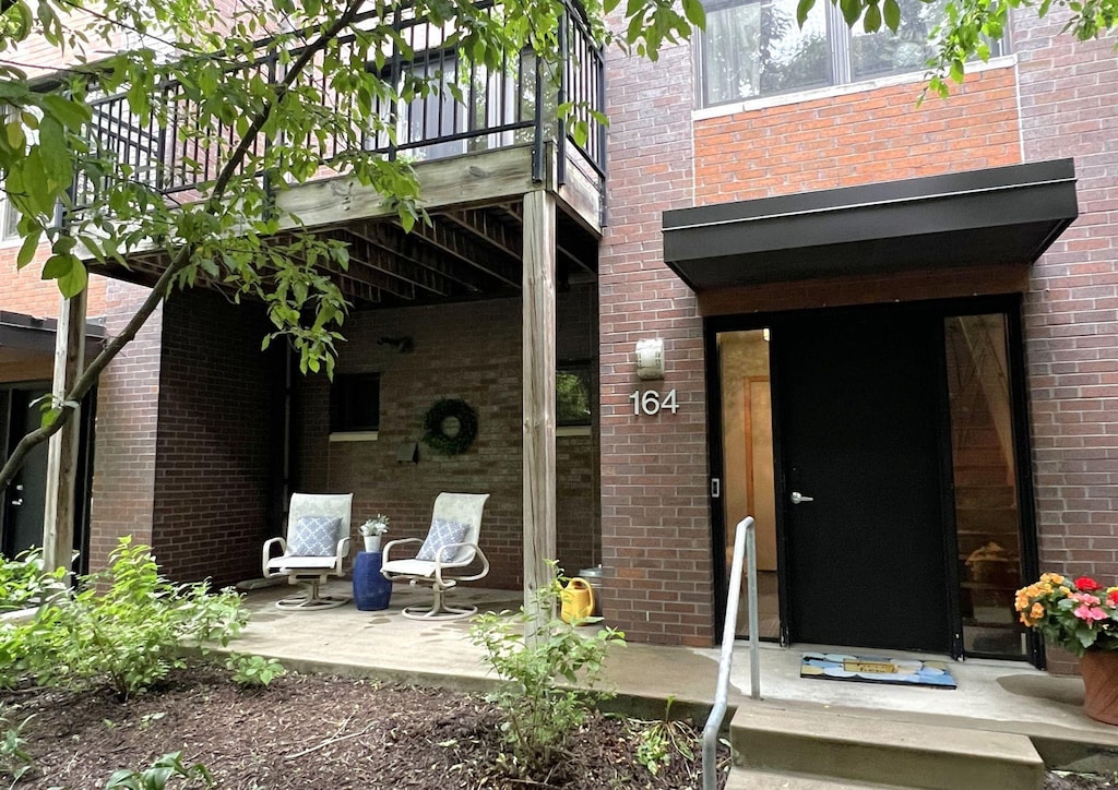 164 2nd St N, Delano, MN 55328 - view of exterior entry with brick siding