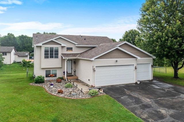 920 Lincoln Ct S, Cambridge, MN 55008 - tri-level home featuring driveway, an attached garage, and a shingled roof
