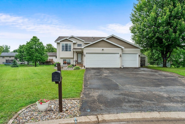 920 Lincoln Ct S, Cambridge, MN 55008 - split level home featuring an attached garage, driveway, a front lawn, and roof with shingles