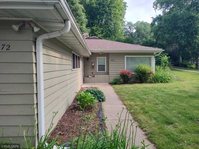 1872 Mississippi River Blvd S, Saint Paul, MN 55116 - view of exterior entry featuring a yard and a chimney