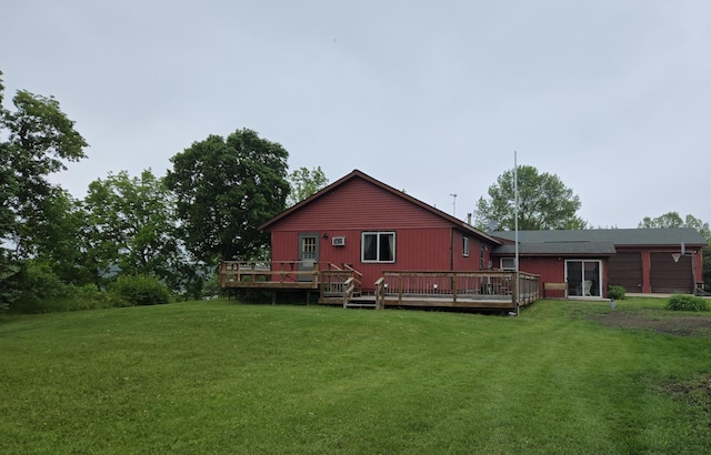 35163 Rose Lake Dr, Frazee, MN 56544 - rear view of house featuring a deck and a yard