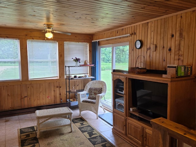 35163 Rose Lake Dr, Frazee, MN 56544 - living room with wood walls, light tile patterned floors, a ceiling fan, and wood ceiling