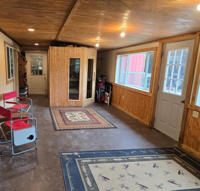 35163 Rose Lake Dr, Frazee, MN 56544 - foyer with concrete floors, wooden ceiling, wooden walls, and recessed lighting