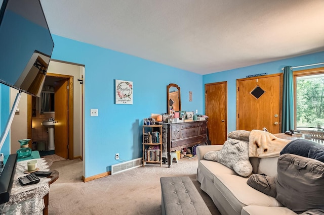 2226 S Ave E, North Saint Paul, MN 55109 - carpeted living area with baseboards