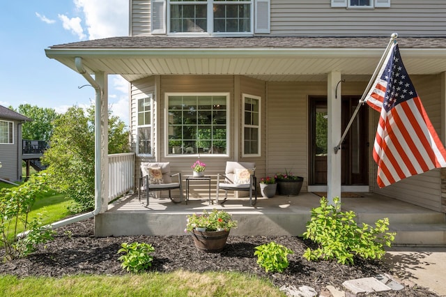 12864 Fondant Trl N, Hugo, MN 55038 - doorway to property featuring a porch and a shingled roof