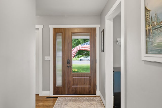 12864 Fondant Trl N, Hugo, MN 55038 - foyer entrance with wood finished floors and baseboards