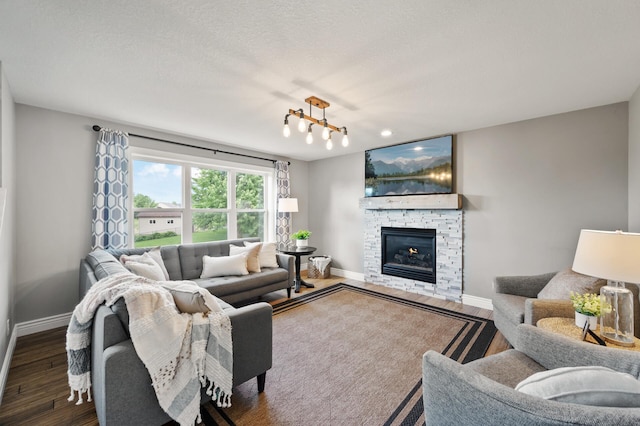 12864 Fondant Trl N, Hugo, MN 55038 - living room with a stone fireplace and wood finished floors