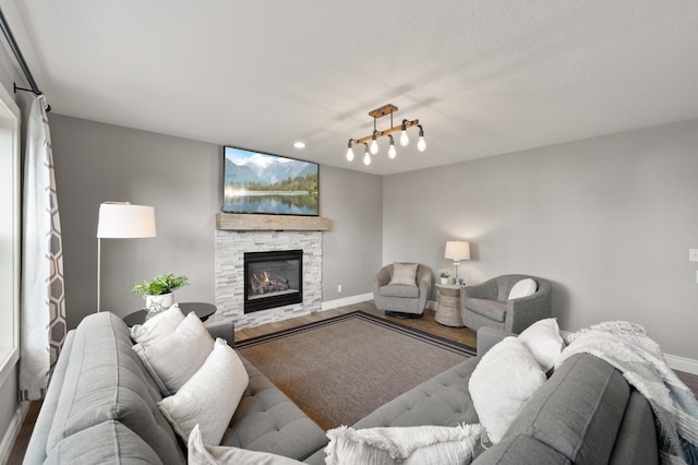 12864 Fondant Trl N, Hugo, MN 55038 - living room with wood finished floors and a stone fireplace