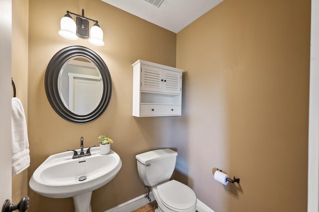 12864 Fondant Trl N, Hugo, MN 55038 - bathroom with toilet and a sink