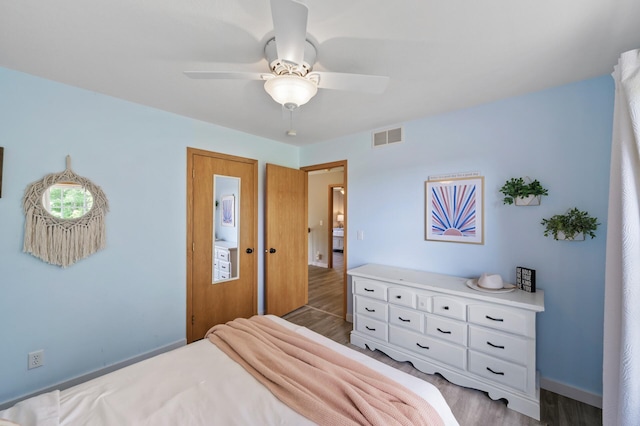 12864 Fondant Trl N, Hugo, MN 55038 - bedroom with light wood finished floors and ceiling fan