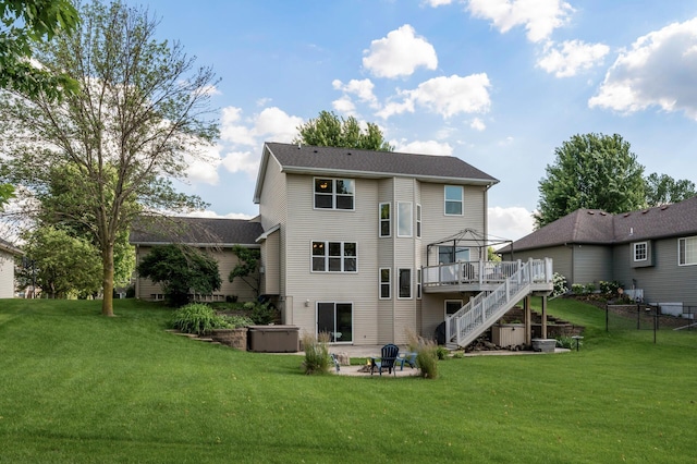 12864 Fondant Trl N, Hugo, MN 55038 - rear view of property with stairway, a gazebo, a deck, a patio area, and an outdoor fire pit