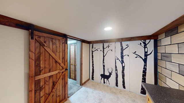 6189 Woods Bay Dr NE, Outing, MN 56662 - below grade area with a barn door, light colored carpet, and recessed lighting
