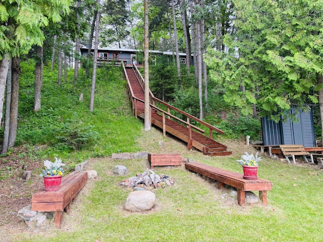 6189 Woods Bay Dr NE, Outing, MN 56662 - view of grassy yard with a storage shed