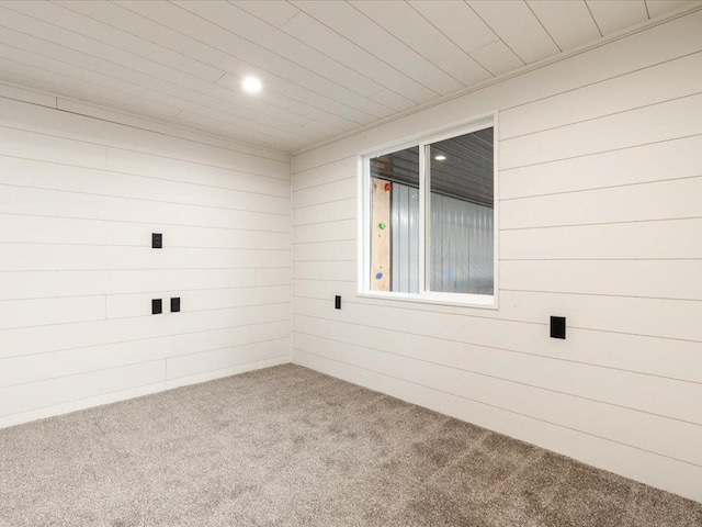 29126 County Road 3, Merrifield, MN 56465 - spare room featuring carpet flooring, wooden walls, and recessed lighting