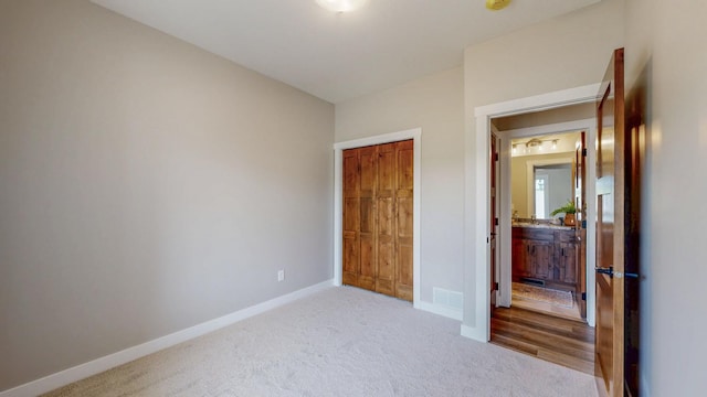 509 Golfview Ave, Zumbrota, MN 55992 - bedroom featuring carpet and a closet