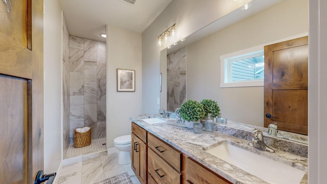 509 Golfview Ave, Zumbrota, MN 55992 - full bath with marble look tile flooring, double vanity, and tiled shower