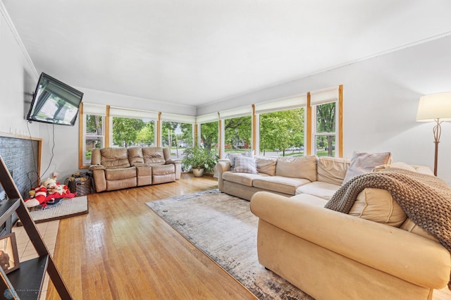 1917 7th St S, Moorhead, MN 56560 - living area featuring wood finished floors and crown molding