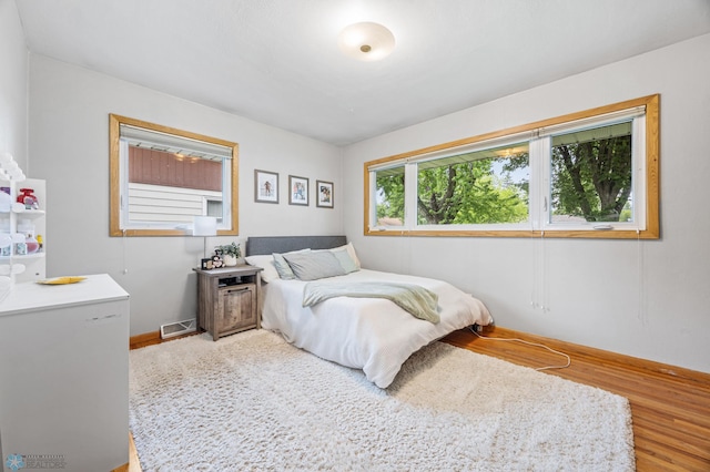 1917 7th St S, Moorhead, MN 56560 - bedroom featuring light wood-style flooring and baseboards