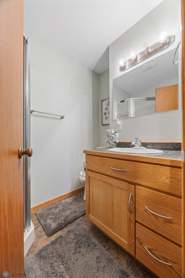 1917 7th St S, Moorhead, MN 56560 - full bathroom with a shower with door and vanity