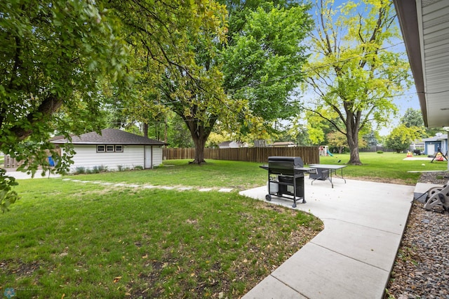 1917 7th St S, Moorhead, MN 56560 - view of yard featuring a patio area