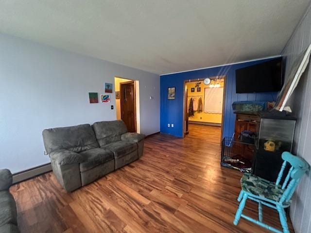 38 Locust Dr, Babbitt, MN 55706 - living room with baseboard heating and wood finished floors
