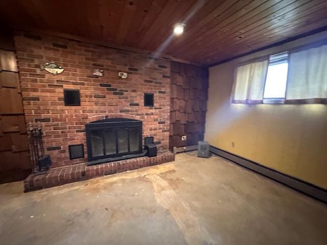 38 Locust Dr, Babbitt, MN 55706 - unfurnished living room with wood ceiling, concrete flooring, baseboard heating, and a fireplace