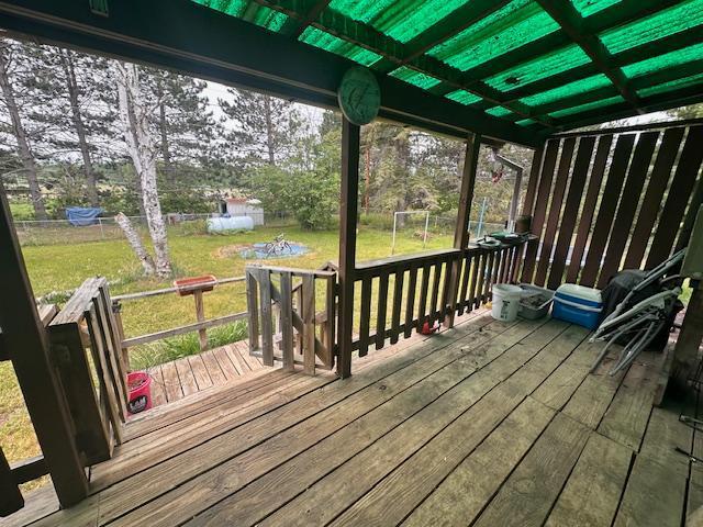 38 Locust Dr, Babbitt, MN 55706 - wooden terrace with a yard