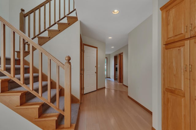 332 Waite Ave S, Saint Cloud, MN 56301 - stairway featuring recessed lighting and wood finished floors